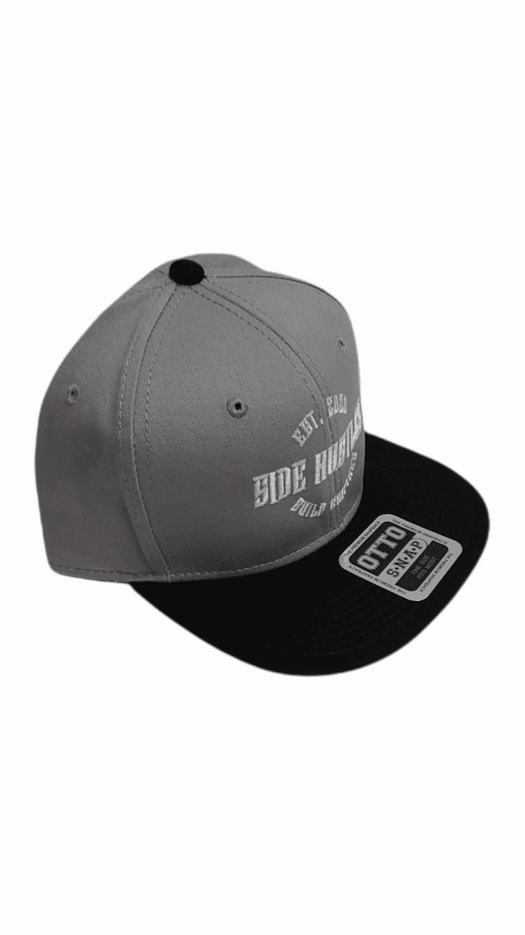 Premium light grey snapback hat with light grey brim and white embroidered side hustle brim on front