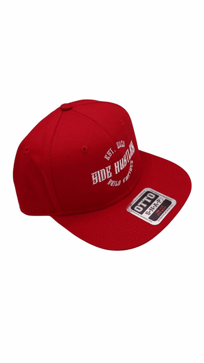Premium all red Otto snapback hat with white side hustle embroidered design on front
